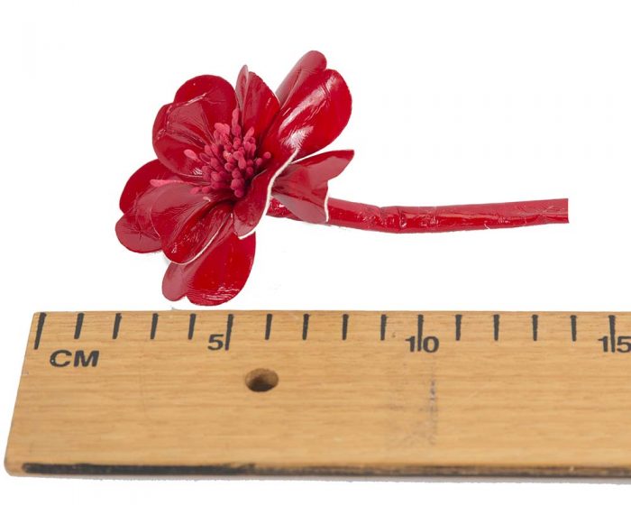 Small shiny red leather flower